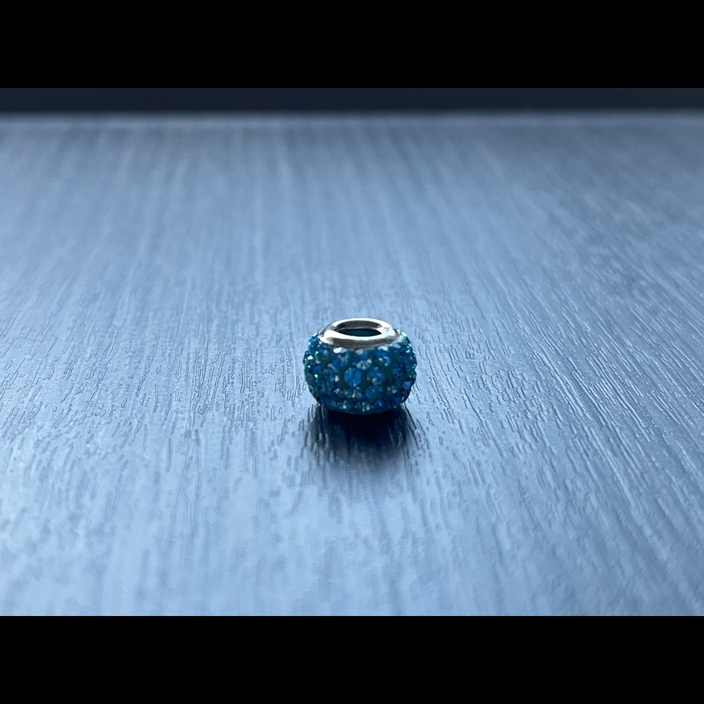 Light blue studded round Pandora charm